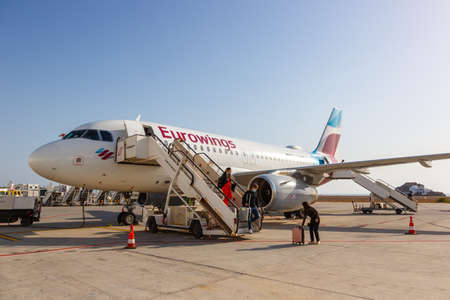 Santorini, Greece - August 4, 2021: Eurowings Airbus A319 airplane at Santorini airport (JTR) in Greece.のeditorial素材