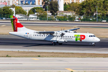 Lisbon, Portugal - September 24, 2021: TAP Portugal Express ATR 72-600 airplane at Lisbon airport (LIS) in Portugal.のeditorial素材
