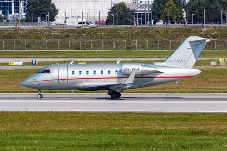Munich, Germany - September 9, 2021: VistaJet Bombardier Challenger 605 airplane at Munich airport (MUC) in Germany.のeditorial素材
