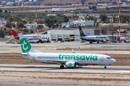 Santorini, Greece - August 4, 2021: Transavia Boeing 737-800 airplane at Santorini airport (JTR) in Greece.のeditorial素材