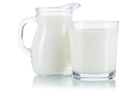 Fresh milk drink in a glass and churn isolated on a white backgroundの写真素材