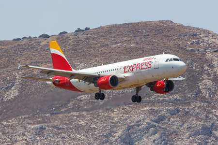 Santorini, Greece - August 4, 2021: Iberia Express Airbus A320 airplane at Santorini airport (JTR) in Greece.のeditorial素材