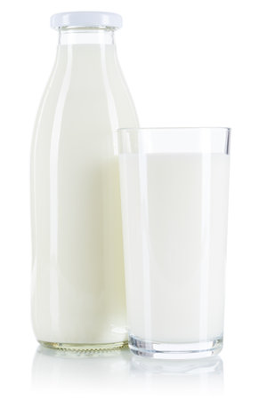Fresh milk drink in a glass and bottle isolated on a white backgroundの写真素材