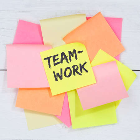 Teamwork team working together business concept desk note paper notepaperの写真素材