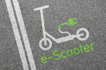 Electric scooter road sign street eco friendly green mobility city transport zone conceptの写真素材