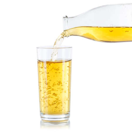 Apple juice pouring apples fruit fruits glass bottle square isolated on a white backgroundの写真素材