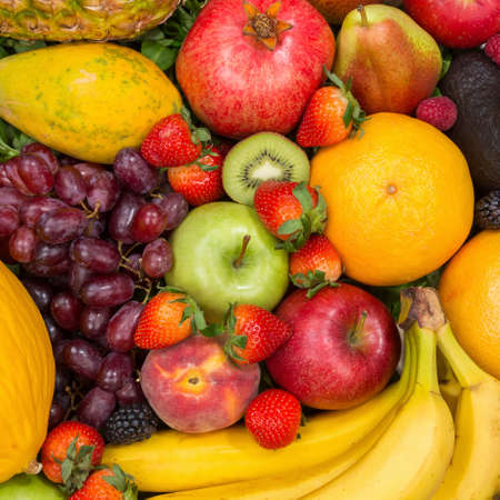 Food background fruits collection apples square berries oranges lemons fruit backgroundsの写真素材