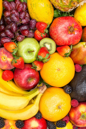 Food background fruits collection portrait format apples berries oranges lemons fruit backgroundsの写真素材