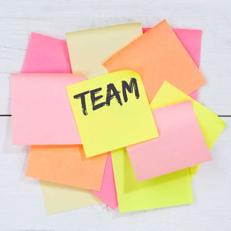 Team teamwork working together business concept desk note paper notepaperの写真素材