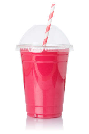 Strawberry smoothie fruit juice straw drink strawberries in a cup isolated on a white backgroundの写真素材