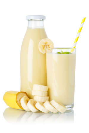 Banana smoothie fruit juice drink milkshake milk shake glass and bottle isolated on a white backgroundの写真素材