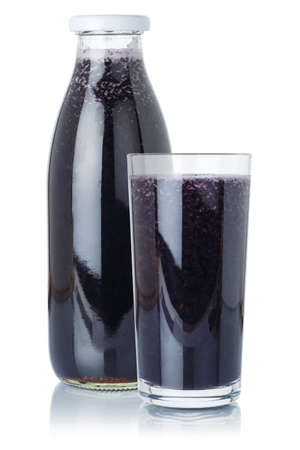 Fresh blueberry smoothie fruit juice drink blueberries in a bottle and glass isolated on a white backgroundの写真素材