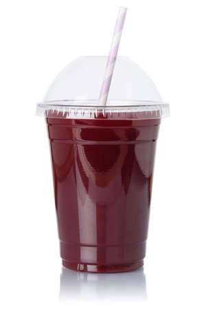 Berry smoothie fruit juice straw drink wild berries in a cup isolated on a white backgroundの写真素材