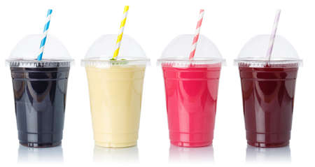Collection of fruit smoothies fruits juice straw drink in cups isolated on a white backgroundの写真素材