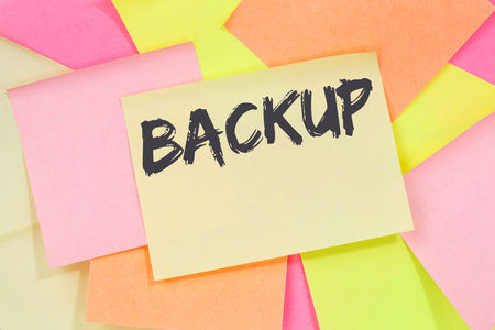 Backup save data on computer technology note paper note paperの写真素材
