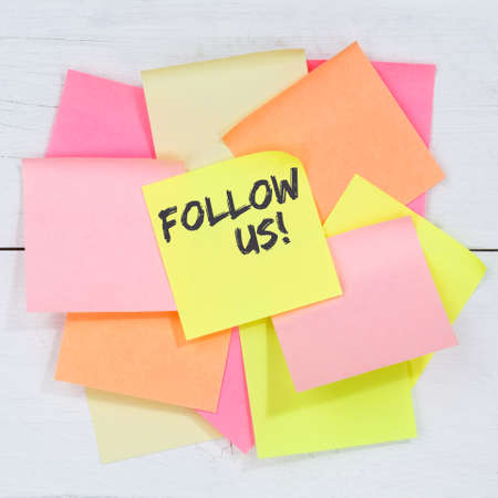 Follow us follower followers fans likes social networking media internet desk note paper notesの写真素材
