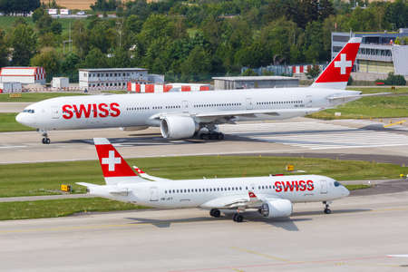 Zurich, Switzerland - July 22, 2020: Swiss Boeing and Airbus airplanes at Zurich Airport (ZRH) in Switzerland.のeditorial素材