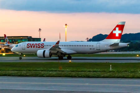 Zurich, Switzerland - July 22, 2020: Swiss Airbus A220-300 airplane at Zurich Airport (ZRH) in Switzerland. Airbus is a European aircraft manufacturer based in Toulouse, France.のeditorial素材