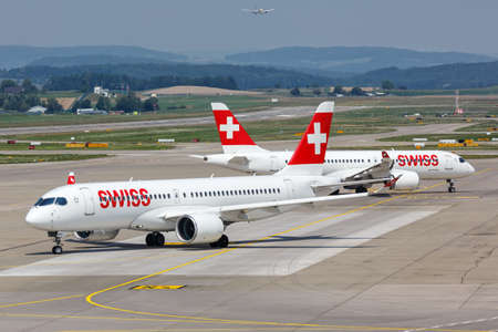 Zurich, Switzerland - July 22, 2020: Swiss Airbus A220-300 airplanes at Zurich Airport (ZRH) in Switzerland. Airbus is a European aircraft manufacturer based in Toulouse, France.のeditorial素材