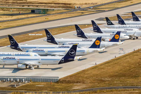 Berlin, Germany - August 19, 2020: Stored Lufthansa airplanes aircraft Coronavirus Corona Virus COVID-19 at Berlin Brandenburg BER airport aerial photo in Germany.のeditorial素材