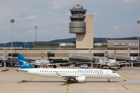 Zurich, Switzerland - July 22, 2020: Montenegro Airlines Embraer 195 airplane at Zurich Airport (ZRH) in Switzerland.のeditorial素材
