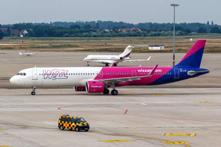 Hanover, Germany - August 9, 2020: Wizzair Airbus A321neo airplane at Hanover Airport in Germany. Airbus is a European aircraft manufacturer based in Toulouse, France.のeditorial素材