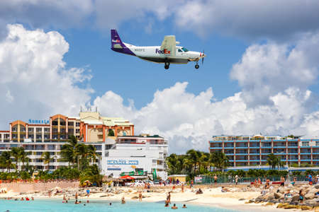 Sint Maarten, Netherlands Antilles - September 16, 2016: FedEx Feeder Cessna 208 airplane at Sint Maarten Airport in the Netherlands Antilles.のeditorial素材