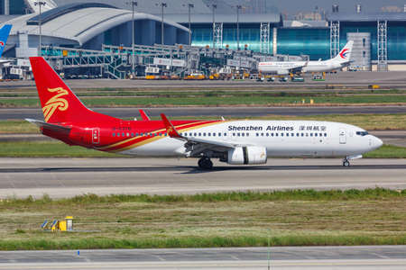 Guangzhou, China - September 24, 2019: Shenzhen Airlines Boeing 737-800 airplane at Guangzhou Baiyun Airport in China. Boeing is an American aircraft manufacturer headquartered in Chicago.のeditorial素材