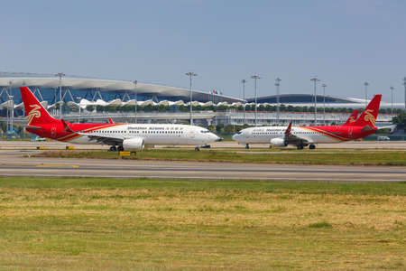 Guangzhou, China - September 23, 2019: Shenzhen Airlines Boeing 737-800 airplane at Guangzhou Baiyun Airport in China.のeditorial素材