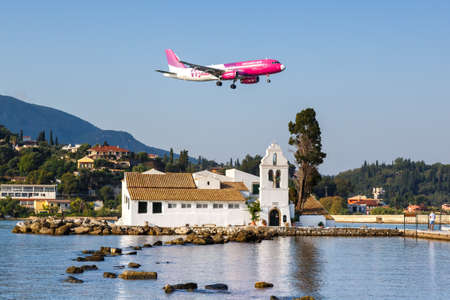 Corfu, Greece - September 20, 2020: Wizzair Airbus A320 airplane at Corfu Airport in Greece. Airbus is a European aircraft manufacturer based in Toulouse, France.のeditorial素材