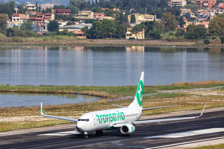 Corfu, Greece - September 19, 2020: Transavia Boeing 737-800 airplane at Corfu Airport in Greece. Boeing is an American aircraft manufacturer headquartered in Chicago.のeditorial素材