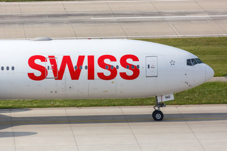 Zurich, Switzerland - July 22, 2020: Swiss Boeing 777-300ER airplane at Zurich Airport in Switzerland. Boeing is an American aircraft manufacturer headquartered in Chicago.のeditorial素材