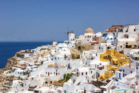 Santorini island holidays in Greece travel traveling Oia town Mediterranean Sea with windmills Santorini Aegean Seaの写真素材