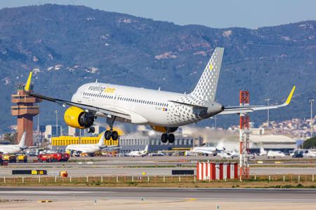 Barcelona, Spain - February 21, 2022: Vueling Airbus A320neo airplane at Barcelona airport (BCN) in Spain.のeditorial素材