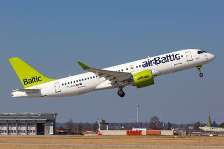 Stuttgart, Germany - March 4, 2022: Air Baltic Airbus A220-300 airplane at Stuttgart airport (STR) in Germany.のeditorial素材