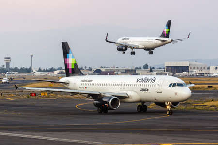 Mexico City, Mexico - April 15, 2022: Volaris Airbus A320 airplanes at Mexico City airport (MEX) in Mexico.のeditorial素材
