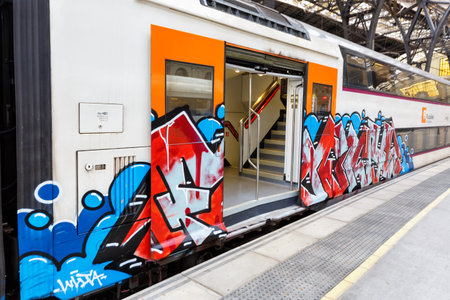 Barcelona, Spain - February 19, 2022: Graffiti on a train at Franca railway station in Barcelona,...