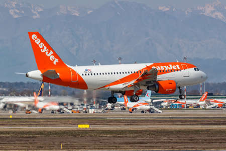 Milan, Italy - March 24, 2022: EasyJet Europe Airbus A319 airplane at Milan Malpensa airport (MXP) in Italy.のeditorial素材
