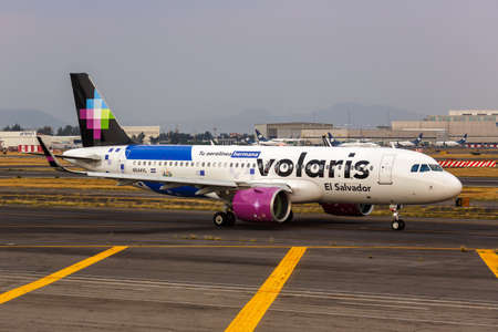 Mexico City, Mexico - April 15, 2022: Volaris El Salvador Airbus A320neo airplane at Mexico City...