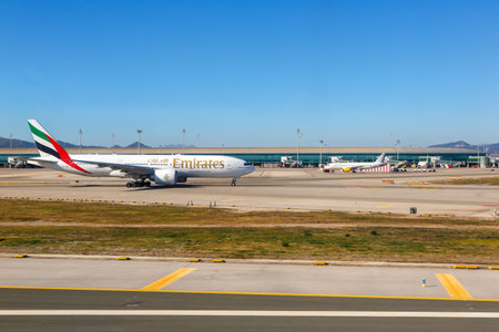 Barcelona, Spain - February 21, 2022: Emirates Airlines Boeing 777-200LR airplane at Barcelona airport (BCN) in Spain.のeditorial素材