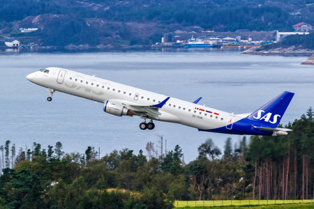 Bergen, Norway - August 18, 2022: SAS Scandinavian Airlines Embraer 190 airplane at Bergen airport (BGO) in Norway.のeditorial素材