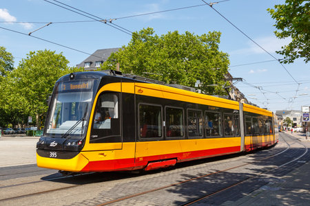 Karlsruhe, Germany - June 30, 2022: Light rail of AVG tram type Stadler CityLink public transport transit at stop main station in Karlsruhe, Germany.のeditorial素材