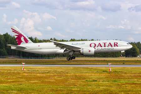 Oslo, Norway - August 15, 2022: Qatar Cargo Boeing 777-F airplane at Oslo airport (OSL) in Norway.のeditorial素材