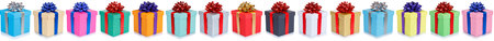 Christmas and birthday gifts presents decoration many in a row collection isolated on a white backgroundの写真素材