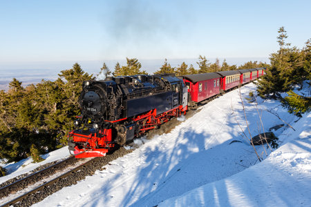 Brockenbahn Steam train locomotive railway rail on Brocken mountain in Germany
