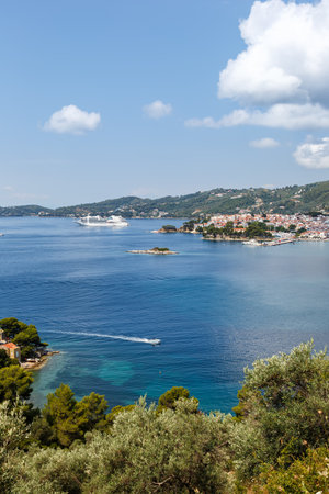 Skiathos town with cruise ship vacation portrait format travel at the Mediterranean Sea Aegean island in Greeceの写真素材
