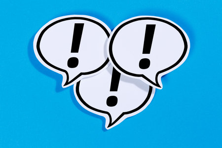 Exclamation mark attention notification alert alarm notice symbol speech bubbles information info communication concept talking sayingの写真素材