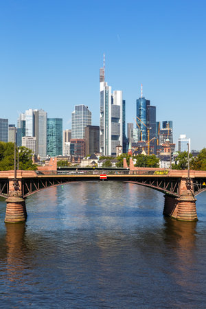 Frankfurt skyline with Main river and Ignatz Bubis Bridge city travel traveling portrait format in Germanyの写真素材