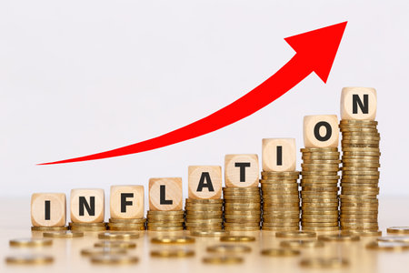 Inflation symbolic photo money finance and economic crisis economy business concept on coinsの写真素材