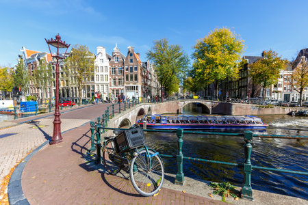 Canal and bridges traditional Dutch houses at Keizersgracht traveling in Amsterdam, Netherlandsの写真素材